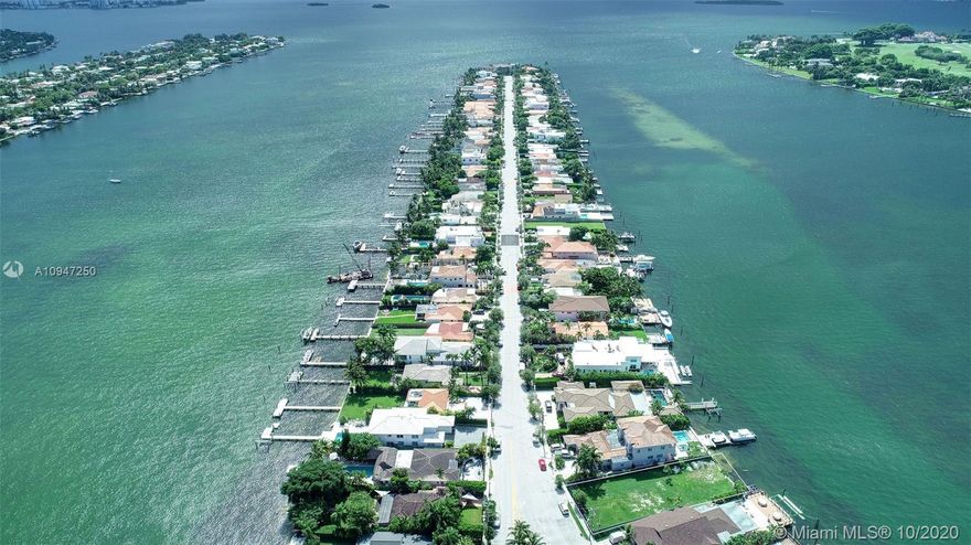 Make Offer Today! One of the best priced waterfront residential parcels available in Miami Beach. This vacant lot is sold w/ approved plans that include an entertainment roof deck with panoramic views. Build a private dock to accommodate a 50 foot boat. Stillwater Drive has 24/7 security with guard and security gate. Ready to start construction immediately! Recently a new waterfront home sold in the area for $4,600,000. The interior layout and facade of the home may still be customized to the new buyers style. Live in the center of it all... just minutes from Bal Harbour Shops, Design District and Lincoln Road. Also listed under RLD. 8,472 SF Waterfront Lot ; 6,306 SF Total Approved Plans (4,236 SF AC) Lot Specs: Street Frontage: 63' ; Water Frontage: 50' ; Lot Depth: 150'