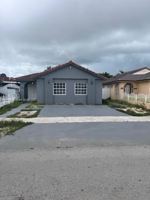 This charming home is nestled in a prime location, boasting proximity to local amenities, public transportation, and highways. However, its interior is a blank canvas waiting for your personal touch. With outdated fixtures, worn-out flooring, and a layout that no longer suits modern living, this property presents a fantastic opportunity for renovation and reinvention. Imagine tearing down walls to create an open-concept living space, installing new windows to flood the rooms with natural light, and updating the kitchen and bathrooms to reflect your style. With some TLC and creative vision, this diamond in the rough can be transformed into a stunning abode that perfectly balances functionality and aesthetics. The possibilities are endless with great potential.