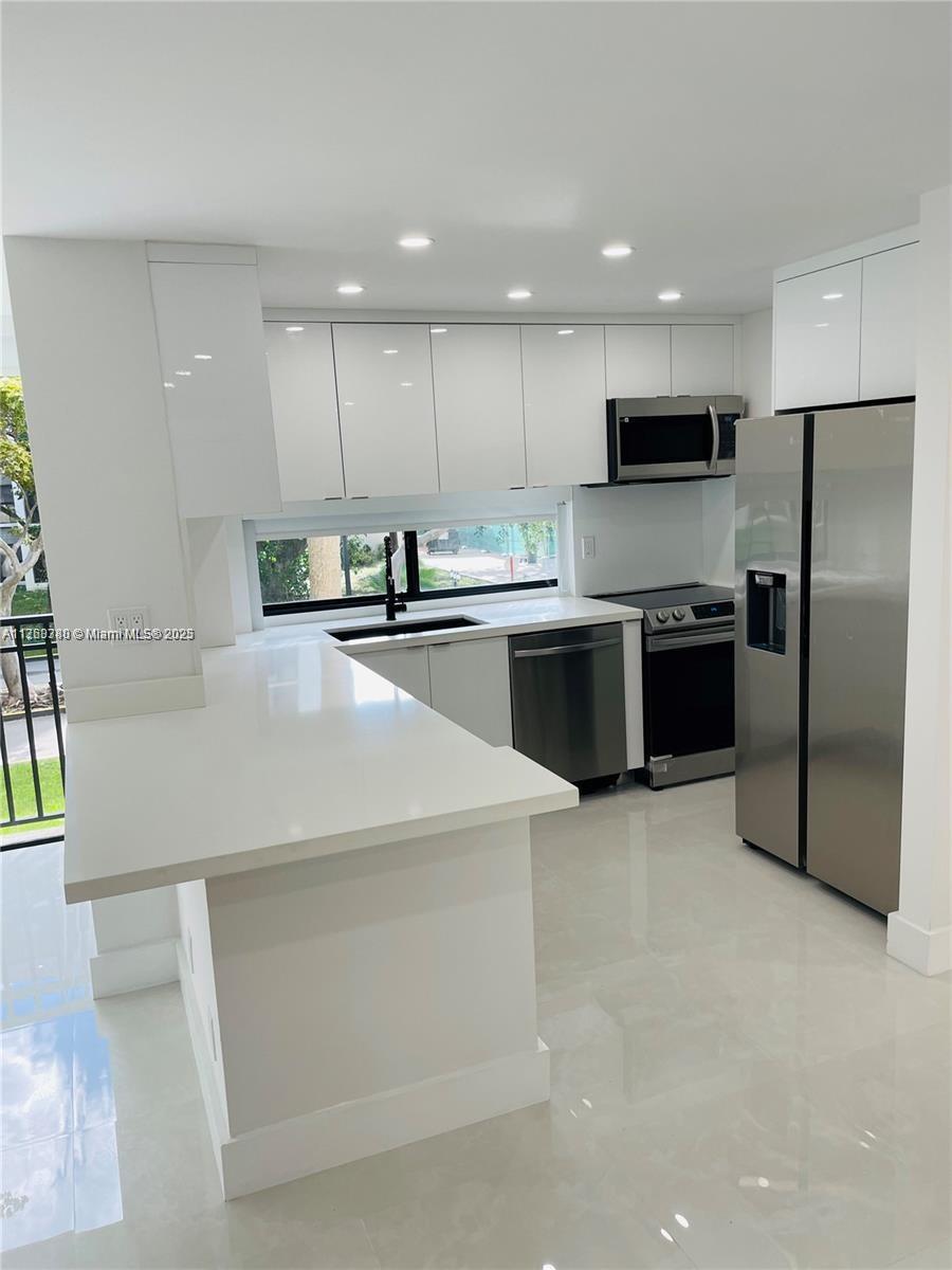 Welcome to this completely remodeled 2 bedroom 2 bathroom condo unit in the heart of Sunny Isles Beach! Featuring a bright, modern, and open layout, this home offers a stunning kitchen with quartz countertops and new stainless steel appliances. With a small storage area, one assigned parking space, and plenty of visitor parking, convenience is at your fingertips. Just a short walk to the beach, this unit is located in the Plaza of the Americas, where residents can enjoy amenities like a pool, jacuzzi, tennis and basketball courts, BBQ area, and more.
The property includes water, basic cable, and internet, and can be rented immediately up to two times per year, making it ideal for investors or part-time living.