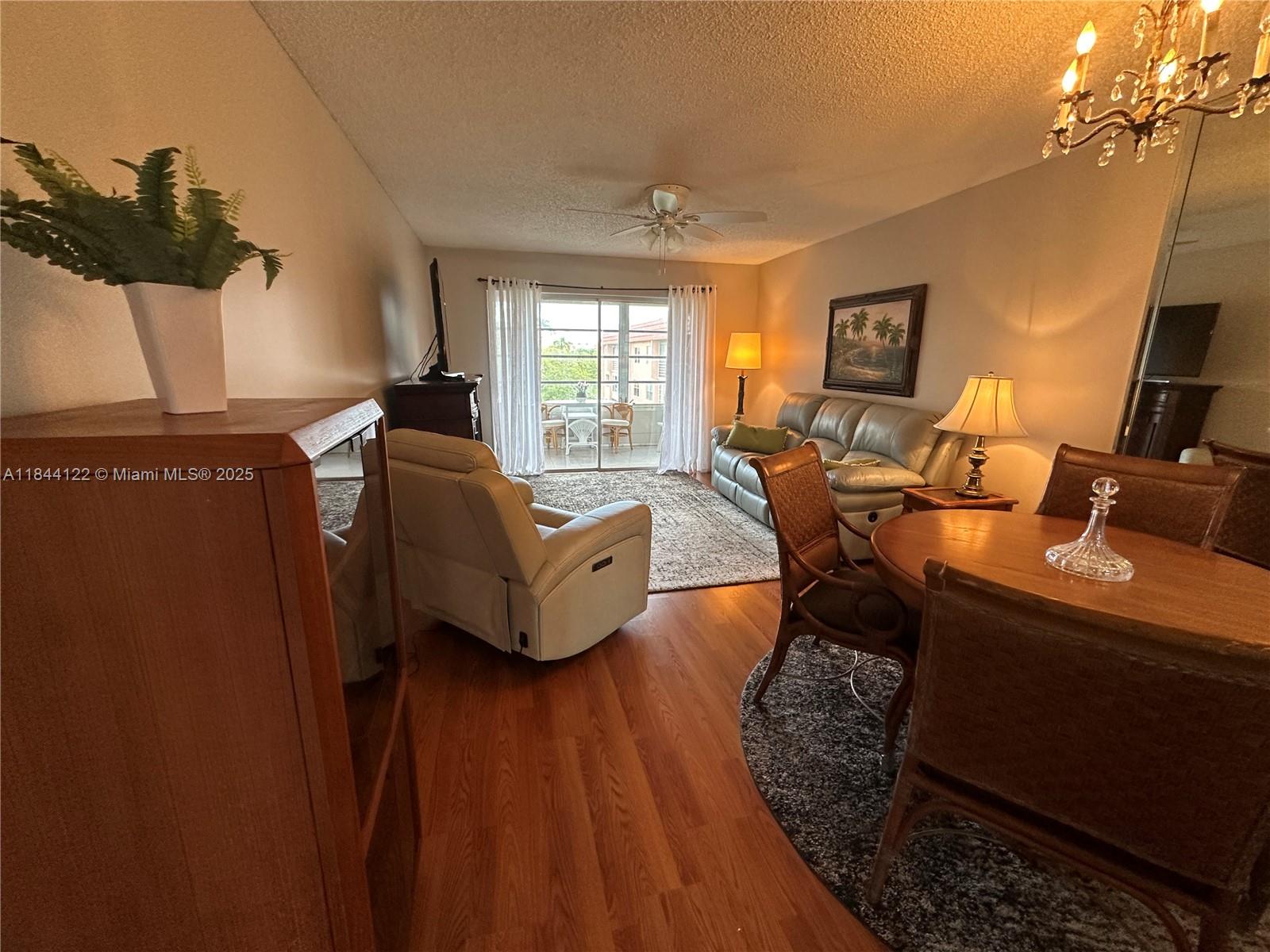 Beautiful one bedroom one bathroom condo in active 55+ community. Updated kitchen boasts new cabinets, faucet, LED lighting, and stainless steel appliances under one year. Bathroom has new toilet, vanity and vanity lighting. Cheerful Bedroom offers large walk-in closet, new LED bedroom fan and more with open view. A/C apx 2 years. New couch and recliner and other furniture optional/sale.
Enjoy a relaxing morning coffee or lunch on enclosed patio with peaceful landscaped and partial water view. Community offers a large array of amenities incuding active clubhouse for featured events, gatherings and social activities; golf, heated pool, gym and more. "Rare" find in lovely Phase 3 at amazing price.