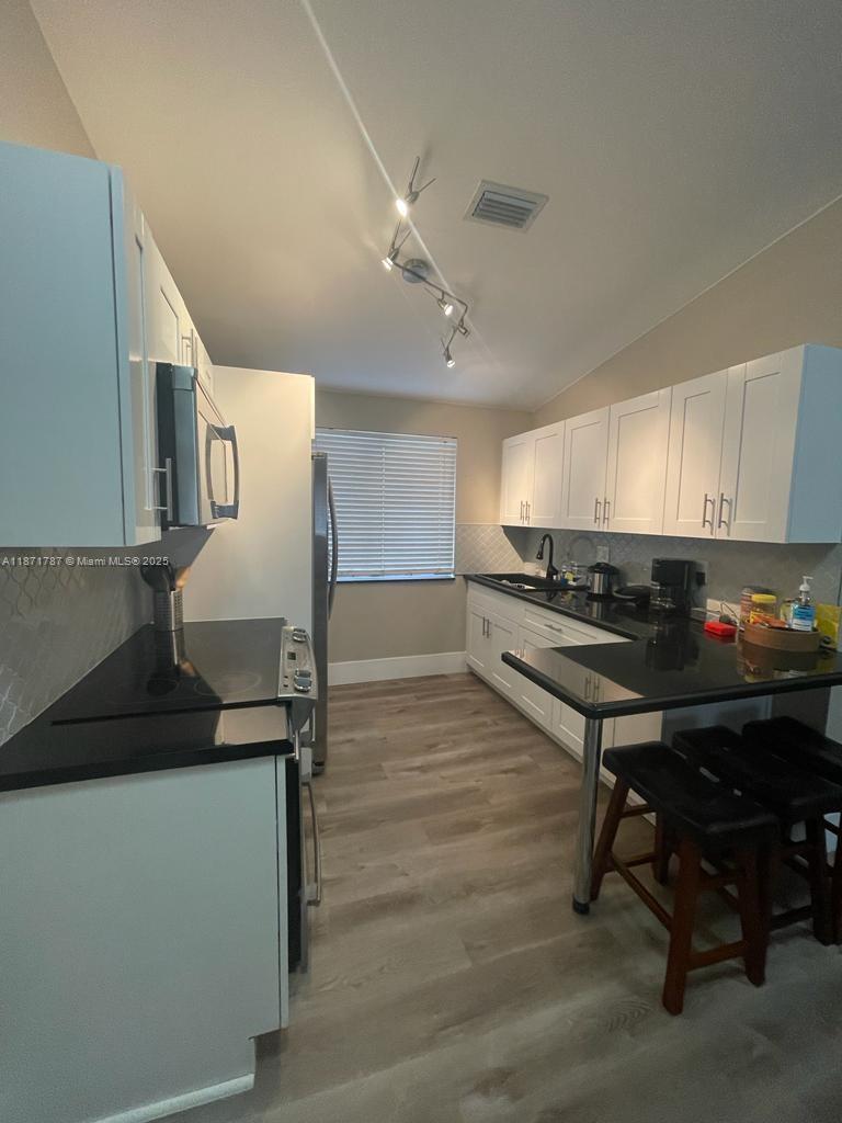 DORAL COURT CONDO - Residential Lease