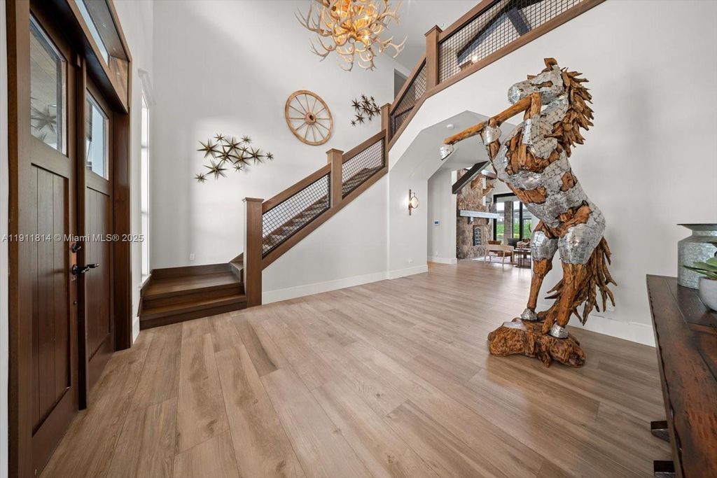 Photo of 16675 C 24 Canal Rd, Port St Lucie, FL 34987 (MLS # A11911814)