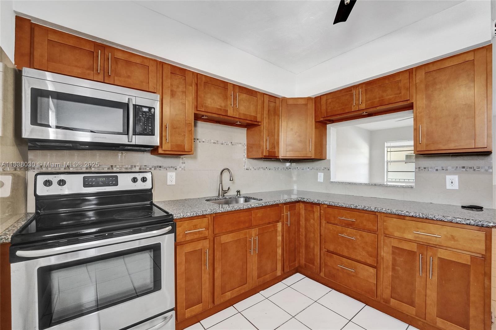 Discover comfort and convenience in this charming 2-bedroom home, nestled in a quiet, well-maintained community. Featuring tile floors throughout, a semi open-concept kitchen, a beautifully renovated bathroom, and ceiling fans in every room, this space is both stylish and functional.
Enjoy access to a sparkling pool and on-site laundry, all just minutes from the highway, top-rated schools, and a major shopping center. A true hidden retreat with everything you need nearby—don’t miss out!