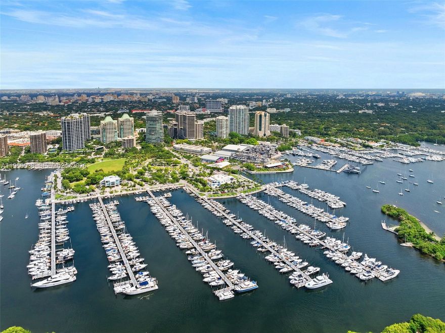 Experience refined waterfront living at the iconic Mr. C Residences in the heart of Coconut Grove and enjoy the best lifestyle possible.   This beautifully appointed two-bedroom, two-bathroom residence offers higher-than-average ceilings, expansive windows, and elegant contemporary finishes throughout.

The open-concept living and dining areas flow seamlessly to a spacious private balcony with tranquil views of lush greenery, marina, and skyline—ideal for relaxing or entertaining. The chef-inspired kitchen features custom Italian cabinetry, premium appliances, terrazzo-style countertops, and designer hardware.

The primary suite includes a spa-style bathroom with freestanding soaking tub, glass-enclosed shower, custom vanity plus thoughtfully designed custom closet maximizing storage space. A generous second bedroom offers flexibility for guests, home office, or den.

Residents enjoy world-class amenities including resort-style pool with cabanas, outdoor spa, state-of-the-art fitness center, resident lounge with billiards, juice bar, and upcoming signature restaurant open to the public. Ideally located on South Bayshore Drive, just steps from Dinner Key Marina, waterfront parks, CocoWalk, dining, shopping, and entertainment.   
This unit is complete with additional storage space and one parking space (valet)

A rare opportunity to own in one of Miami’s most sought-after luxury waterfront communities.