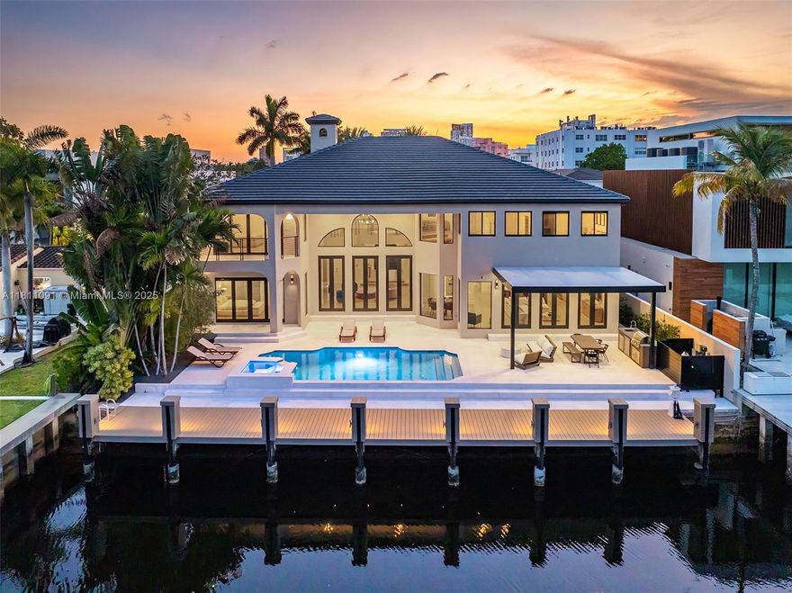 Unrivaled waterfront luxury awaits at this Fort Lauderdale estate, boasting 80 feet of deep-water frontage with no fixed bridges for direct ocean access. Beyond a grand motor court, 5,500 sq ft of newly renovated interiors seamlessly blend modern elegance with timeless comfort, all framed by panoramic water views.
Expansive living spaces flow into a sprawling backyard oasis that beckons with a sparkling pool, lush tropical landscaping, and a private dock for your yacht. All of this is just moments from vibrant Las Olas Boulevard and the Atlantic Ocean, offering elegance, adventure, and convenience in equal measure.