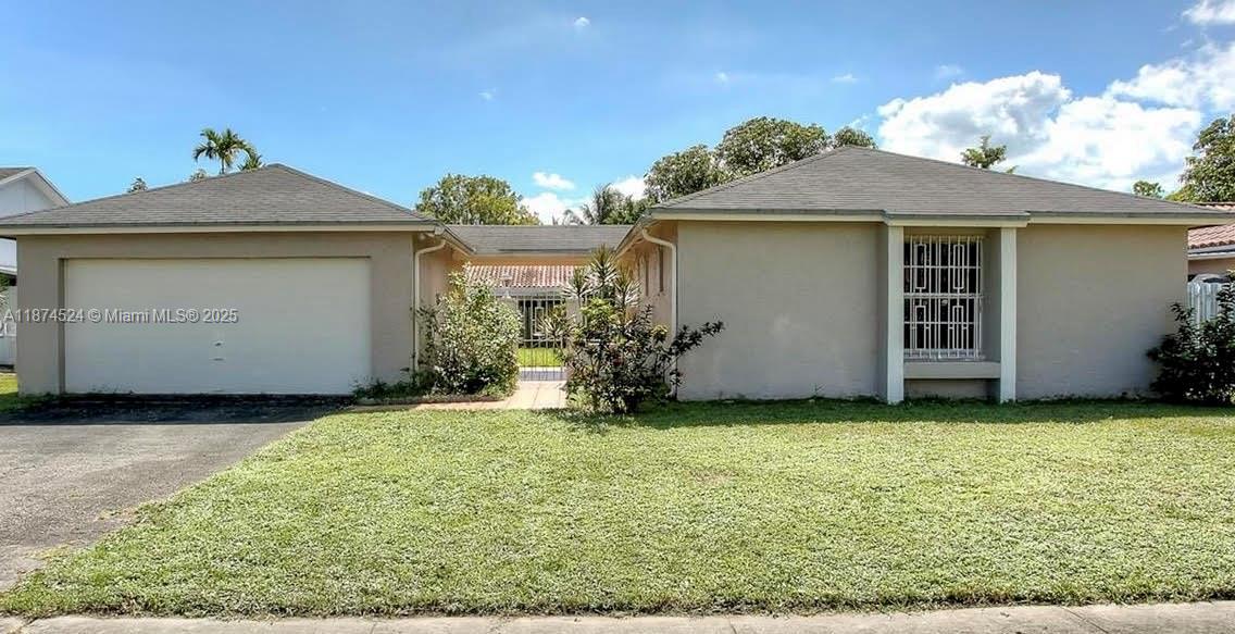 This 2 bedroom 2 bath home has Impact windows, new roof, new water heater and AC just 3 years old, in-law quarters available.