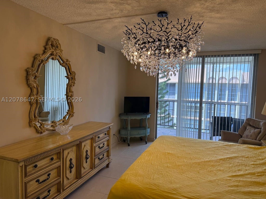 Photo of 851 Three Islands Blvd #511, Hallandale Beach, FL 33009 (MLS # A12078647)