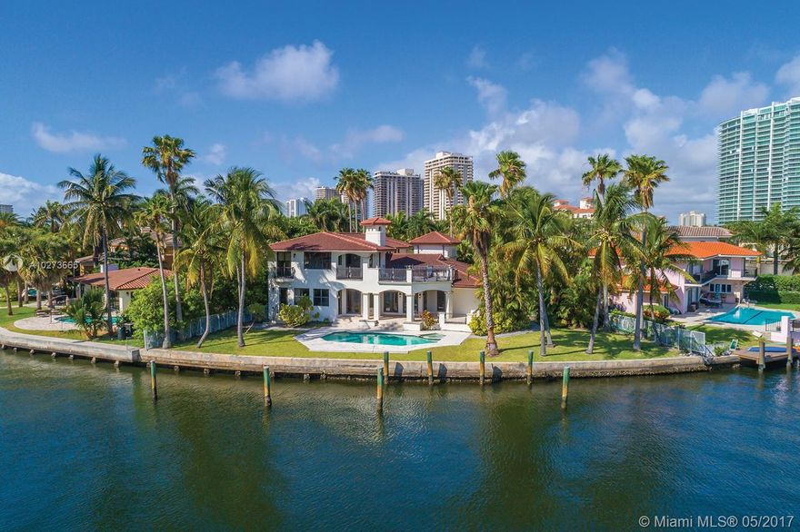 Enjoy ultimate island living in this beautiful 5 bedroom, 5 bathroom estate in exclusive Golden Beach. Featuring 136 FT WF, sitting on an expansive 12,642 SF lot situated on a cul-de-sac, the home boasts a waterfront pool w/covered outdoor seating & a cabana bathroom, movie theatre, volume ceilings, 2 car garage, formal dining room, 2 fireplaces, spacious master bedroom complete w/ office & large balcony, expansive walk-in closets, a gym, gourmet kitchen w/ top-of-the-line Subzero & Thermador appliances
