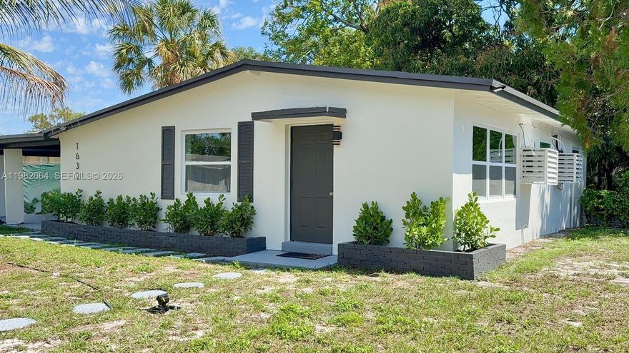 This move-in-ready single family home offers the rare opportunity to enjoy a newly renovated, spacious home in an established, peaceful community.  Beautifully remodeled (total area 1,363 sqft) 3-bedrooms, 1-bathroom single-family home located in the heart of Fort Lauderdale. NEW ROOF 2025 and impact windows. White Kitchen cabinets with modern QUARTZ countertop. Convenient AC split all around the house to avoid high consumption bills of energy.  Large laundry room equipped with a washer and dryer with space for storage. The backyard is fully enclosed by a private fence, offering a secure and expansive space for pets, play, or weekend gatherings. Additional features include a large carport and a prime location just minutes from the vibrant entertainment of downtown Fort Lauderdale and its world-famous beaches.