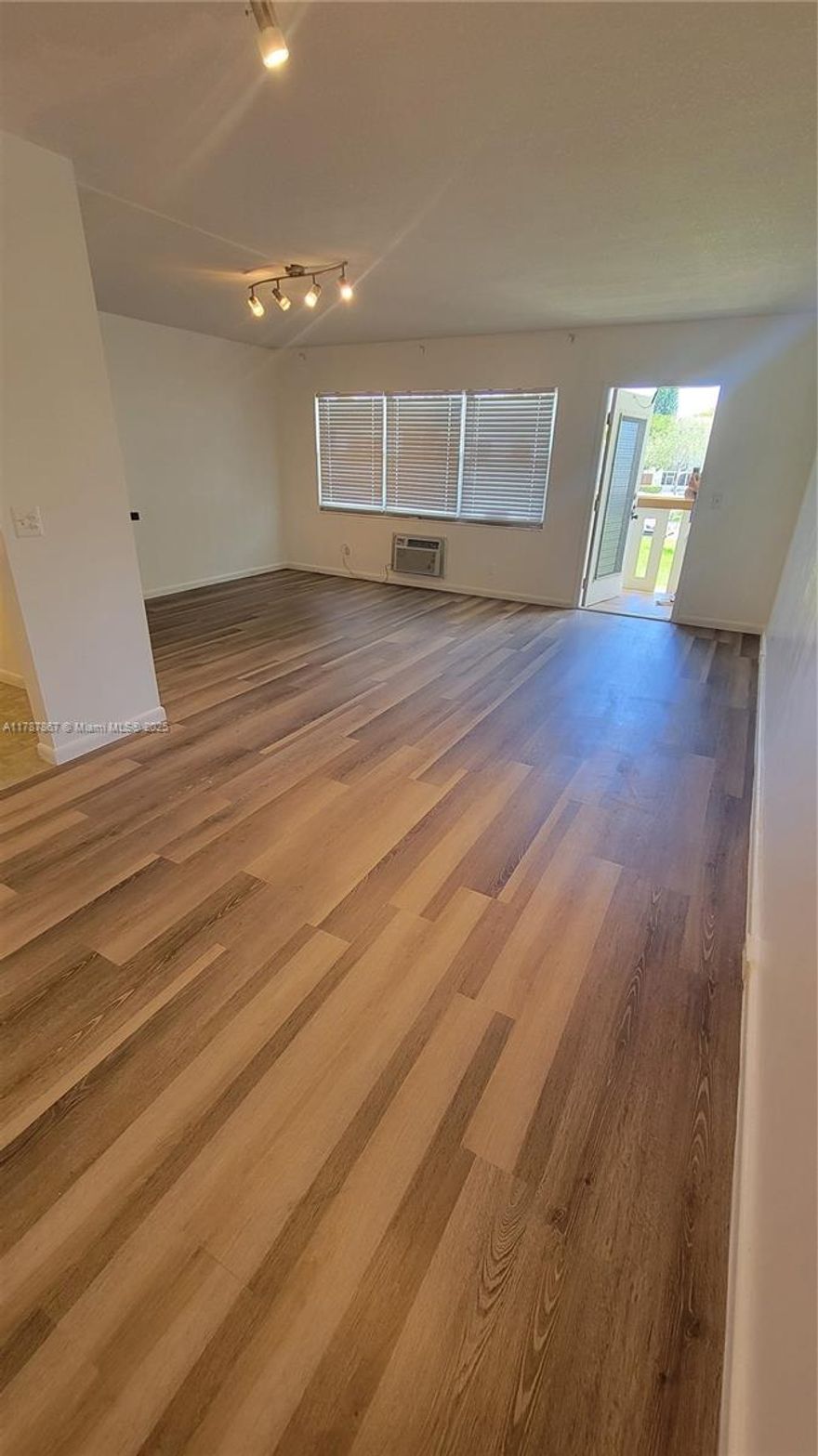 BEAUTIFUL APARTMENT. Most desirable 1 bed and 1.5 bath 2nd floor unit with Central AC. Century Village is a 55+ community with many activities, entertainment and amenities, walking and biking paths, billiards, tennis courts, pickleball courts, bocce, and shuffleboard. The open-concept floor plan offers a variety of design options and a light, bright space.Updated wood laminate flooring throughout and upgraded fixtures and finishes. LEASE IS OK RIGHT AWAY.