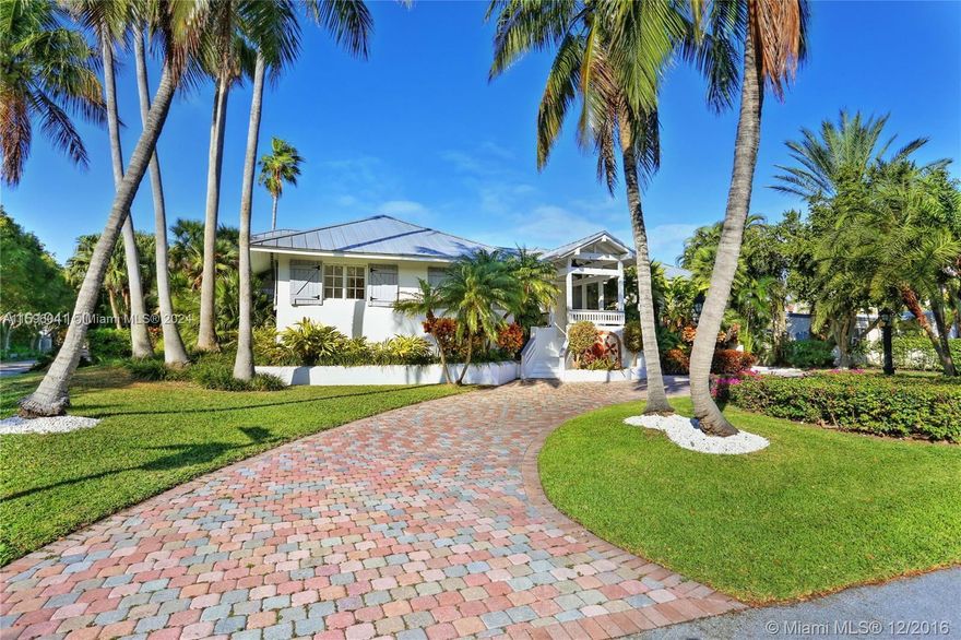 BEAUTIFUL HOME! LOCATED ON AN OVERSIZED LOT IN PRESTIGIOUS HOLIDAY COLONY. ELEGANT FINISHES THROUGHOUT, ELEVATED,  2 STORY, 4 BEDROOMS, 4 BATH, HIGH CEILINGS IN THE ENTERTAINMENT AREAS, MODERN FLOORING AND SOPHISTICATED KITCHEN WITH TOP OF THE LINE APPLIANCES AND GAS STOVE. MAIN BEDROOM ON THE 2ND FLOOR HAS WOOD FLOORING, LARGE BUILT-IN CLOSETS AND PRIVATE BATHROOM AREA WITH DOUBLE SHOWER.  EXPANSIVE WOOD POOL DECK SURROUNDED BY LUSCIOUS LANDSCAPING. ENCLOSED 2 CAR GARAGE CONNECTED TO THE HOUSE. GREAT LOCATION ON THE EAST SIDE OF CRANDON BOULEVARD.