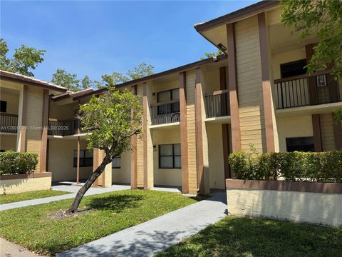 Photo of 11329 Royal Palm Blvd #C-1, Coral Springs, FL 33065 (MLS # A11780503)