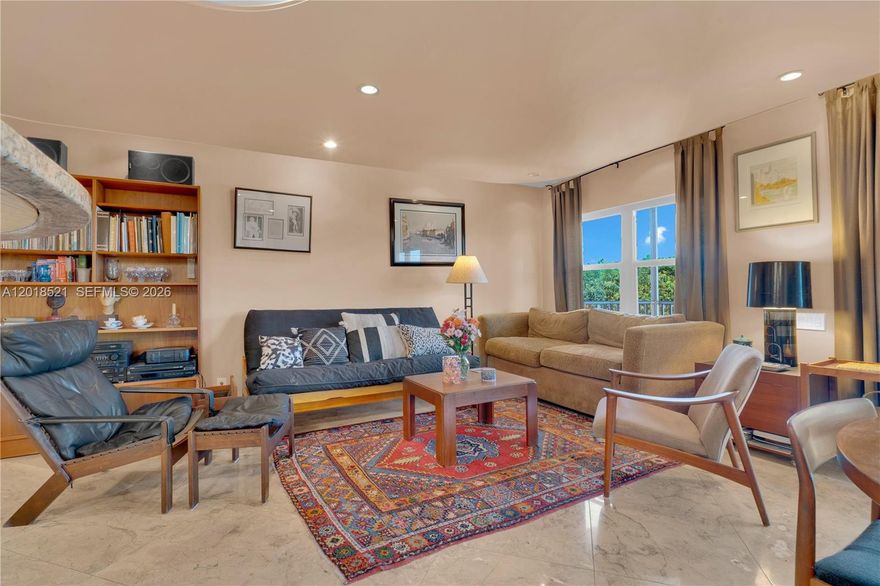 Beautiful corner-unit condo in Hallandale Beach offering water views and a bright, open split floor plan. The primary suite features hardwood floors, a walk-in closet, and a jacuzzi tub. Second bedroom with carpet and a full bath with shower. Living room showcases marble flooring throughout. This well-maintained residence also includes hurricane-impact windows and doors for added security and peace of mind. Ideally located in Hallandale, just minutes from shopping, dining, entertainment, beautiful beaches and major commuter routes. HOA includes Water/sewer, pool, gym, storage, basic cable, WiFi and much more. Schedule your private showing today!