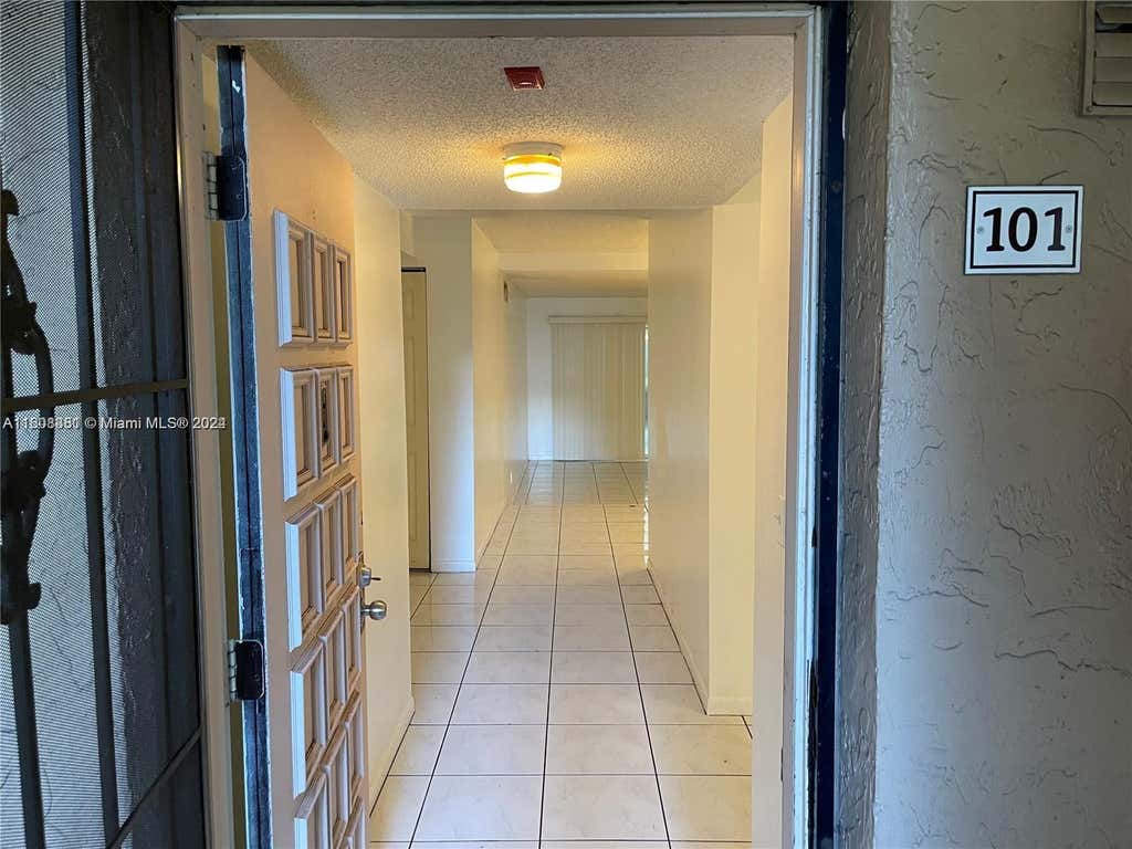 Photo of 2700 Coral Springs Dr #101, Coral Springs, FL 33065 (MLS # A11608381)