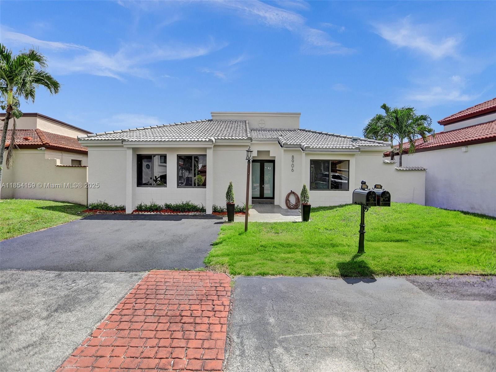 Beautifully remodeled 3-bedroom, 2-bath home in a gated community. This modern residence offers a spacious layout with abundant natural light, sleek finishes, and contemporary design throughout. The updated kitchen features a center island, ample storage, and a dedicated dining area perfect for entertaining. Enjoy the convenience of an in-unit washer/dryer and the comfort of upscale living in a prime location.