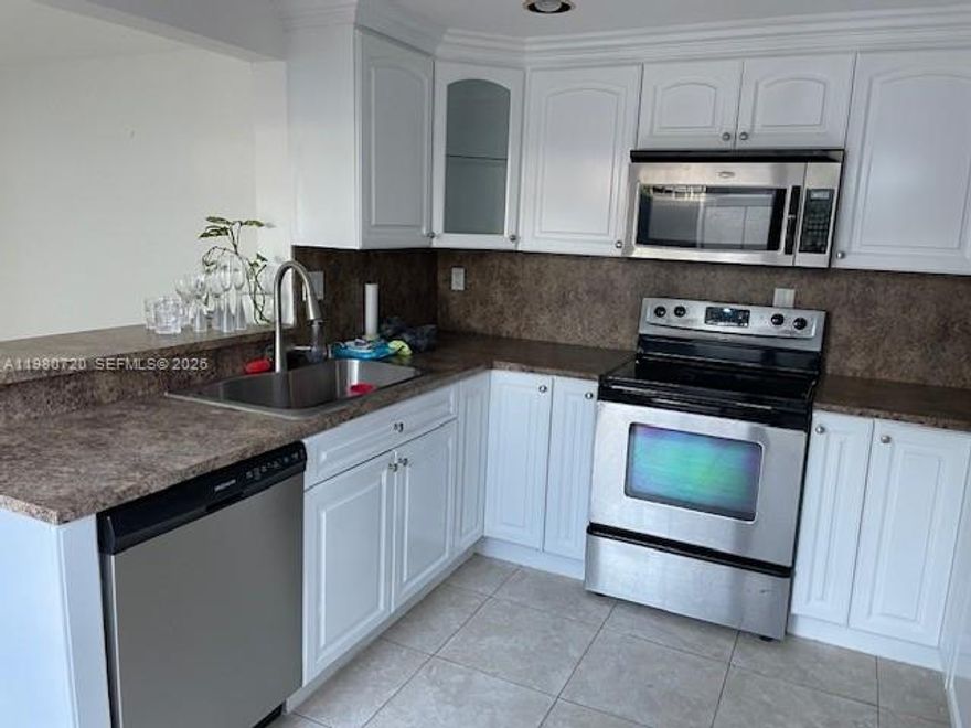 OASIS TOWNHOUSE! LARGEST MODEL, SPACIOUS  3 BEDROOM 2 1/2 BATH CORNER TOWNHOUSE IN SOUGHT AFTER OASIS CONDOMINIUMS. A HIDDEN GEM! THIS PRIVATE GATED COMMUNITY WITH LUSH LANDSCAPING, TWO SWIMMING POOLS, DOGGIE PARK AND QUIET AMBIANC. PERFECT CENTRAL LOCATION WITHIN 5 MINUTES OF CORAL GABLES, SOUTH MIAMI AND WITH EASY ACCESS TO THE PALMETTO EXPRESSWAY AND A 5 MINIUTE DRIVE TO SHOPPING AND LOCAL DINING. UPDATES INCLUDE: WHOLE HOUSE IMPACT GLASS WINDOWS AND DOORS, A/C WITH ANTIBACTERIAL LIGHT. WASHER & DRYER, REFRIGERATOR AND DISHWSHER. TWO PARKING SPACES AND A PRIVATE WALLED IN PATIO PERFECT FOR OUTDOOR ENTERTAINING OR A FAMILY BBQ. OPEN SUNDAY FROM 2:30 TO 4:30 CALLAGENTS FOR ENTRY CODE.