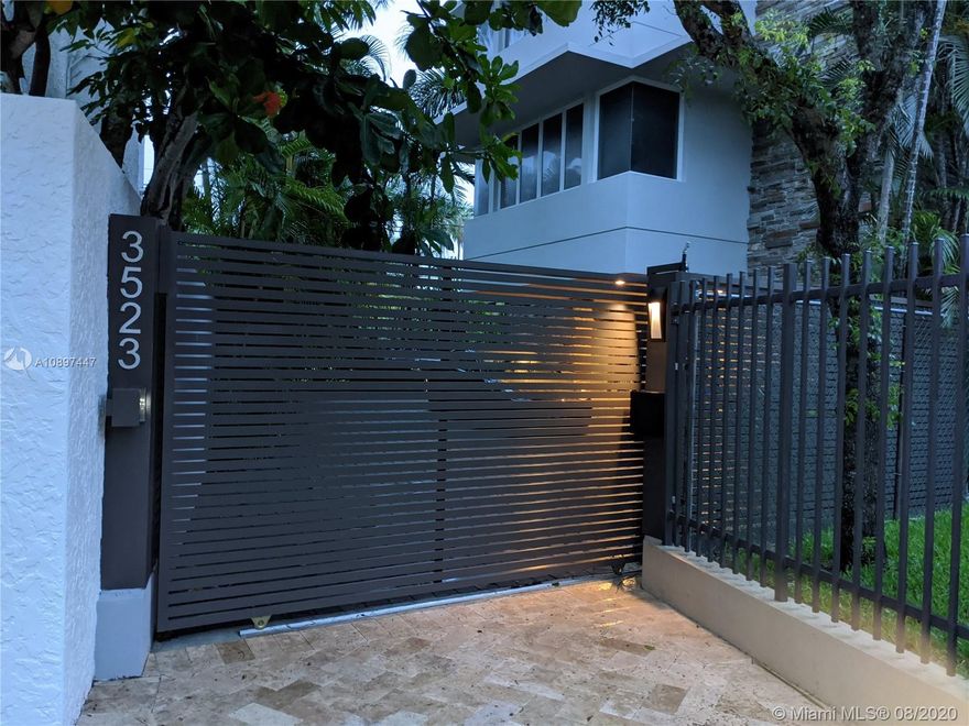 Resilient Bay front home with amazing water views. Custom builder/owner is in process of completing new staircase, new elevator, new lap pool, new master bath, new master closet, new generator with auto transfer switch, new driveway, new gate and motor all included in list price.  Resort style living within the Grove Village. Elevated 17 feet (Flood Ins only $650 p/yr). Secluded, gated, resort-style home directly on Biscayne Bay within walking distance to downtown Coconut Grove, schools, parks, shopping and more. Includes a concrete boat dock and pier with adjustable ramp for easy access into Biscayne Bay. Highlights includes covered parking, multiple outdoor entertainment areas, large laundry storage room air conditioned. Architectural plans available.