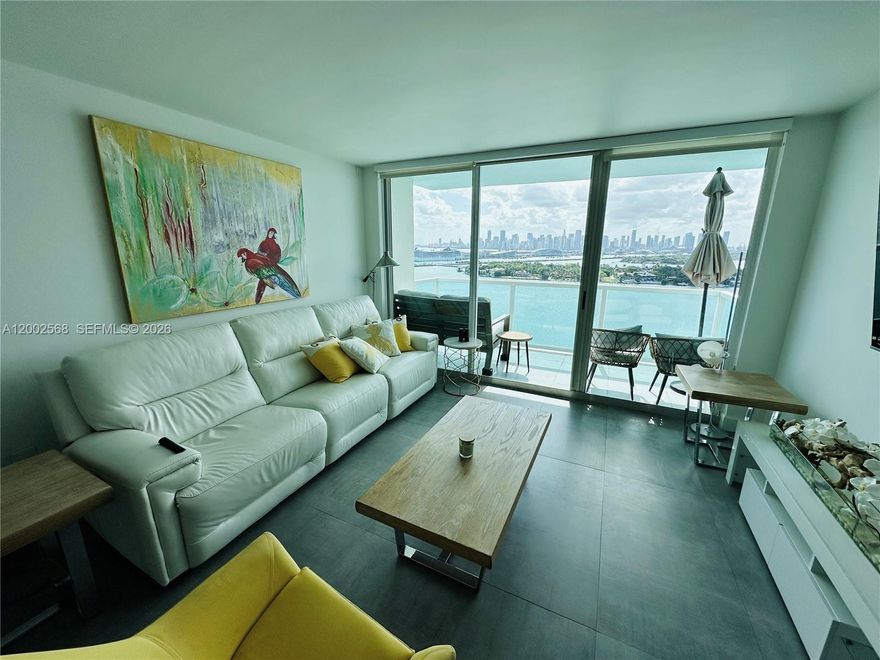 Available 1 June.  Tenant Occupied - 24 hour advance notice to show.   Fully Furnished Split 2 Bed 2 Bath floorplan with direct Bay West facing stunning views. Open chef's kitchen with a beautiful integrated wood dining table. Top of the line Miele appliances with coffee maker, counter depth refrigerator and new the Italian cabinetry. New lightning system with dimmers and Nest Thermostat. Fully renovated bathrooms, all done in a modern European style. The Floridian is a full service building, with hair salon, convenience store, valet parking, tennis courts, pool, steps away from the best of south beach. Walking distance to amazing restaurants, supermarkets and stores. One parking space #230  included. Tenant responsible for Building application and all fees in attachments.  NOTE:  Some of the furniture in the photos is not included in the rental.