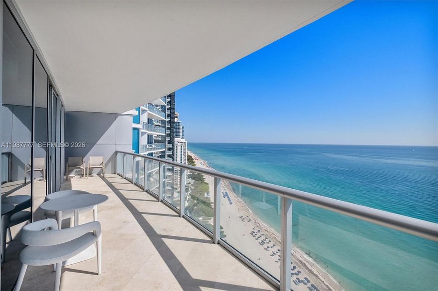 Experience elevated oceanfront living at Jade Beach in Sunny Isles Beach. This stunning 27th-floor residence offers breathtaking & unobstructed views of the Atlantic Ocean through floor-to-ceiling glass and expansive terraces. Unit 2702 features a spacious layout with private elevator entry, offering 2 bedrooms, 3 full bathrooms, and a den that can easily function as a third bedroom or home office. The desirable split floor plan provides optimal privacy, while the open-concept living and dining areas are filled with natural light and seamlessly connect to oversized terraces—perfect for indoor-outdoor living and entertaining. The gourmet kitchen is equipped with premium appliances & sleek cabinetry, ideal for both casual dining and hosting. The primary suite is a private retreat with direct ocean views, a spa-inspired bathroom, and ample closet space. Jade Beach delivers a full-service, resort-style lifestyle including beachfront service, oceanfront infinity pools, state-of-the-art fitness center, spa, concierge, and 24-hour security. Located in the heart of Sunny Isles Beach, just minutes from Bal Harbour Shops, fine dining, and top-rated schools. A rare opportunity to own in one of Sunny Isles’ premier oceanfront buildings with flexible living space and exceptional views.