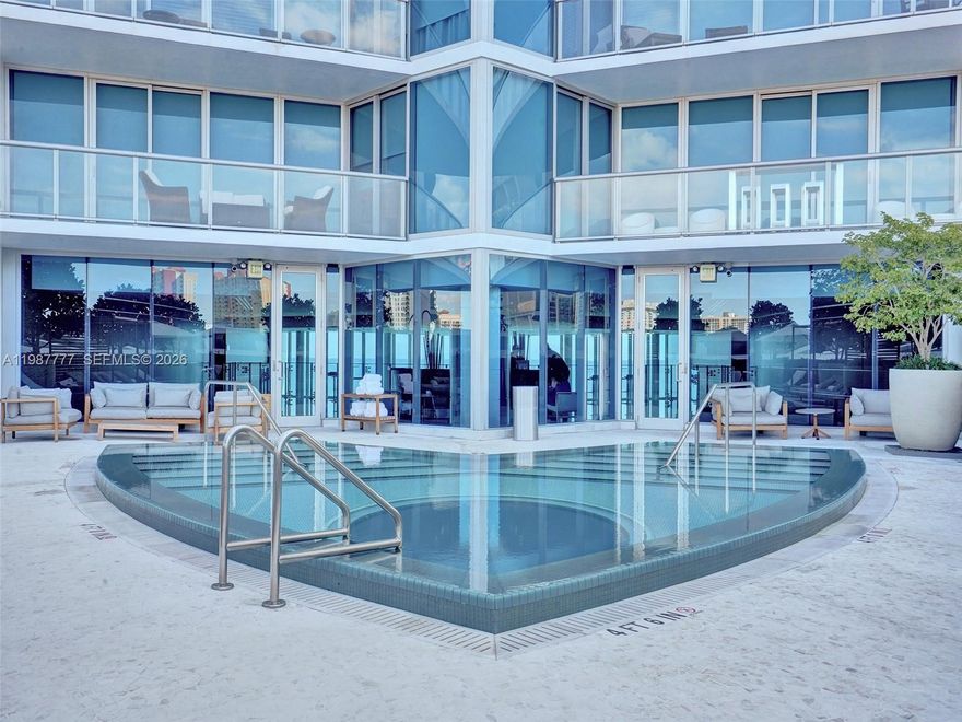 Experience elevated oceanfront living at Jade Beach in Sunny Isles Beach. This stunning 27th-floor residence offers breathtaking & unobstructed views of the Atlantic Ocean through floor-to-ceiling glass and expansive terraces. Unit 2702 features a spacious layout with private elevator entry, offering 2 bedrooms, 3 full bathrooms, and a den that can easily function as a third bedroom or home office. The desirable split floor plan provides optimal privacy, while the open-concept living and dining areas are filled with natural light and seamlessly connect to oversized terraces—perfect for indoor-outdoor living and entertaining. The gourmet kitchen is equipped with premium appliances & sleek cabinetry, ideal for both casual dining and hosting. The primary suite is a private retreat with direct ocean views, a spa-inspired bathroom, and ample closet space. Jade Beach delivers a full-service, resort-style lifestyle including beachfront service, oceanfront infinity pools, state-of-the-art fitness center, spa, concierge, and 24-hour security. Located in the heart of Sunny Isles Beach, just minutes from Bal Harbour Shops, fine dining, and top-rated schools. A rare opportunity to own in one of Sunny Isles’ premier oceanfront buildings with flexible living space and exceptional views.