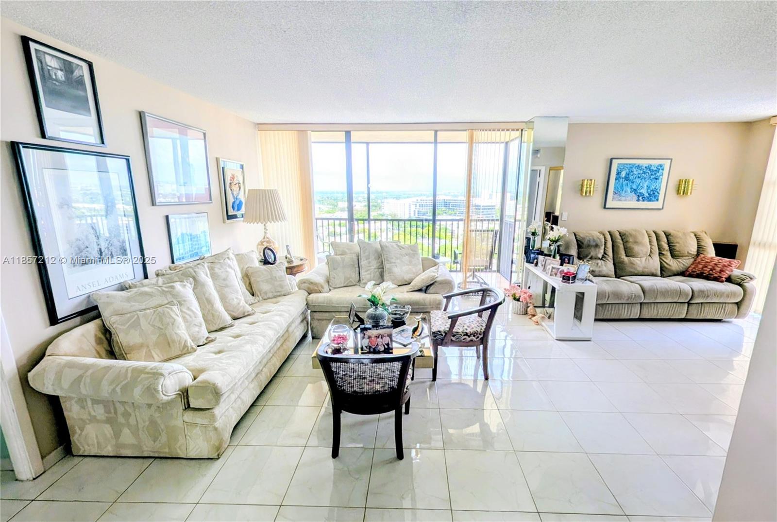 Guard gated, high floor 2/2 with breathtaking western views of the golf course & city lights beyond. Neat, clean & cared for by one owner. Covered parking space steps from the elevators. The building has undergone complete renovation, including modernized lobbies, new elevators, and passed all required inspections. Coronado offers exceptional amenities, including pool, fitness center, & clubhouse. Set up as open den but can be easily restored for a private 2nd BR. This premier Aventura location is unbeatable, steps from the Aventura Mall, fine restaurants, Turnberry Isle, and the Aventura Circle fitness path. With all major building assessments already paid, this is a rare opportunity for a move-in-ready unit in an ideal location. Seller financing available, call broker for details.