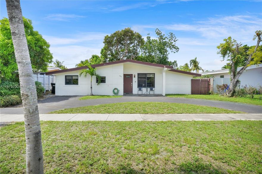 Spacious and full of charm, this beautifully maintained home features 5 generously sized bedrooms and 3 full bathrooms, including a luxurious master suite with a private jacuzzi. The updated kitchen opens into a large dining area with stunning cathedral ceilings—perfect for entertaining. A separate living room and dedicated laundry room add to the functionality. Enjoy a 6,000 sq ft lot with a circular driveway for ample parking. Located just minutes from I-95 and within walking distance to houses of worship, this property offers both comfort and convenience in the heart of North Miami Beach.