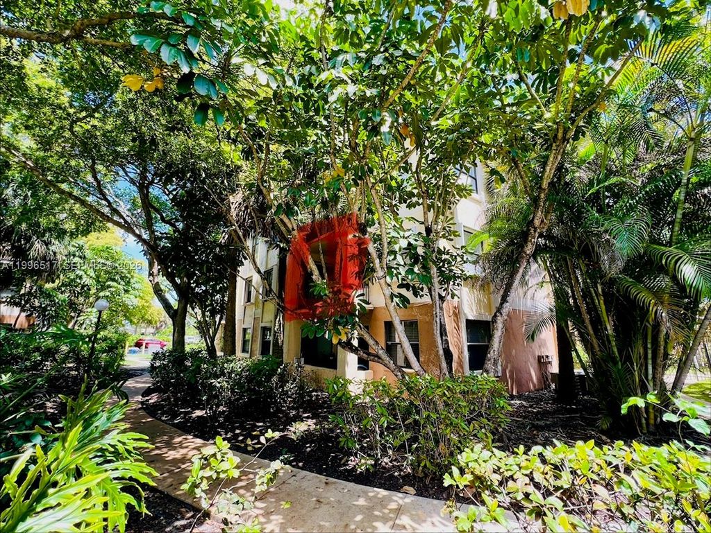 Photo of 9999 Summerbreeze Dr #214, Sunrise, FL 33322 (MLS # A11996517)