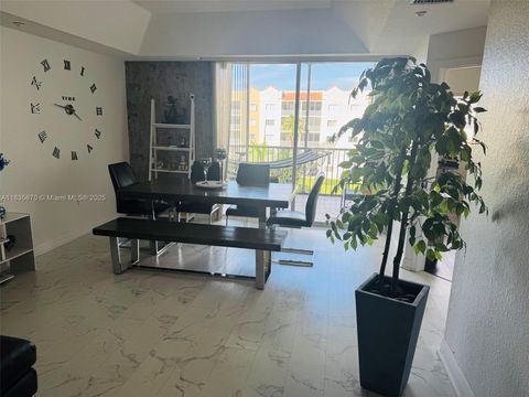 Photo of 10700 NW 66th St #414, Doral, FL 33178 (MLS # A11835870)