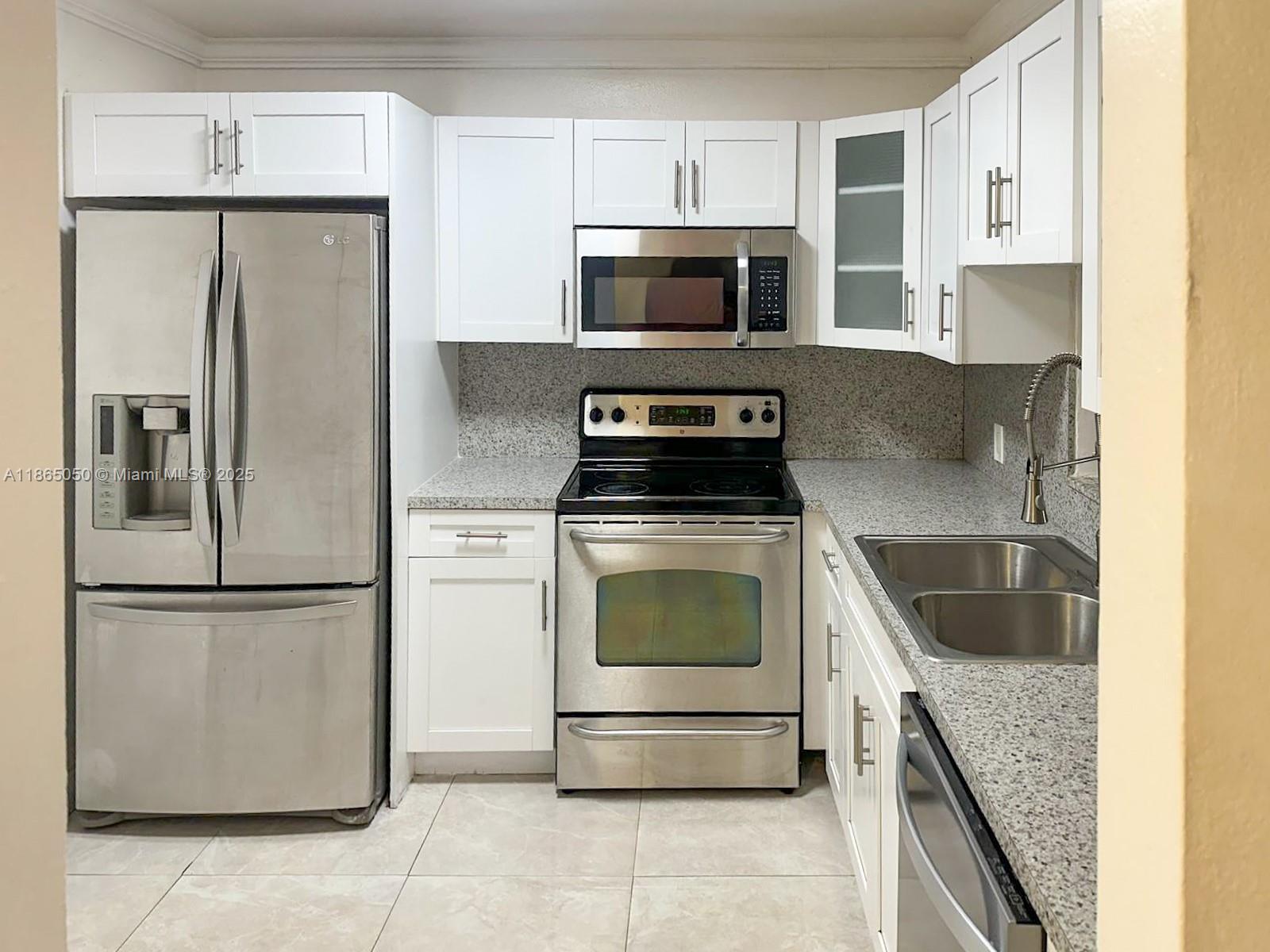 Live in the heart of North Miami in this spacious 2 bed, 2 bath condo located in the gated community of Capri Gardens. This 1st-floor unit features a new kitchen with stainless steel appliances, ample living and dining space, tile floors, and the convenience of parking right in front. Enjoy resort-style amenities including a swimming pool, tennis courts, fitness center, green areas, and guest parking. Prime location near Barry University, Nova, FIU, and I-95. Association requires a 645+ credit score.