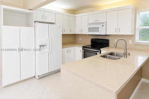 Photo of 464 NE 210th Cir Ter #201-10A, Miami, FL 33179 (MLS # A12069600)