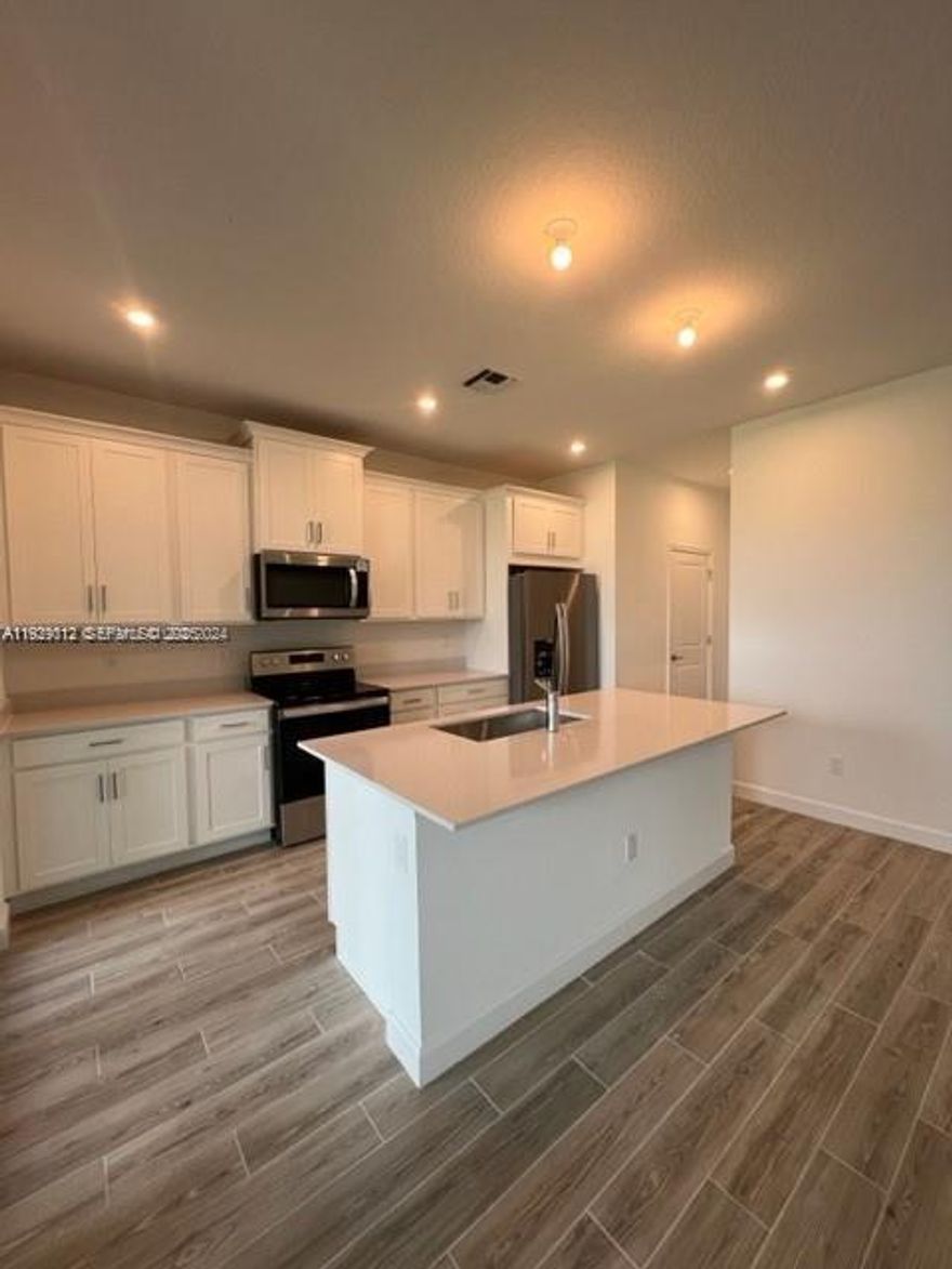 Brand new construction. Experience a sophisticated and relax life style in Tradition?with resort-style amenities. This 1,751 square foot Townhome features an open-concept design with 3 bedrooms, 2.5 baths, and more! The kitchen features ample counter space, large island, and substantial walk-in pantry. Abundant natural light.