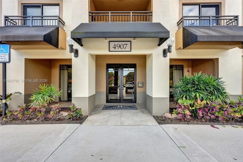 Photo of 4907 Midtown Ln #1314, Palm Beach Gardens, FL 33418 (MLS # A11962790)