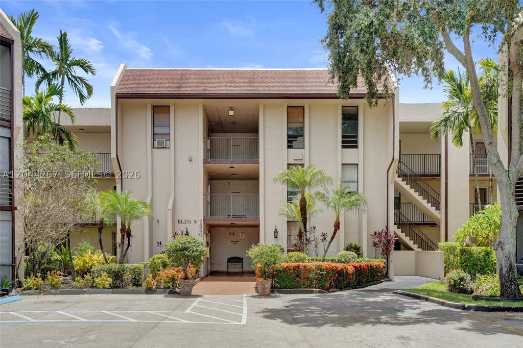 Photo of 7850 W Mcnab Rd #210, Tamarac, FL 33321 (MLS # A12044267)