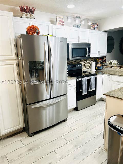 Tiny photo for 9835 Riverside Dr #7-39, Coral Springs, FL 33071 (MLS # A12078514)