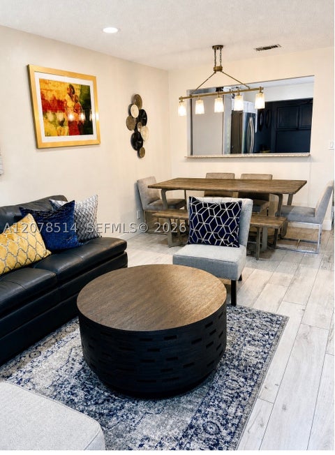 Photo of 9835 Riverside Dr #7-39, Coral Springs, FL 33071 (MLS # A12078514)