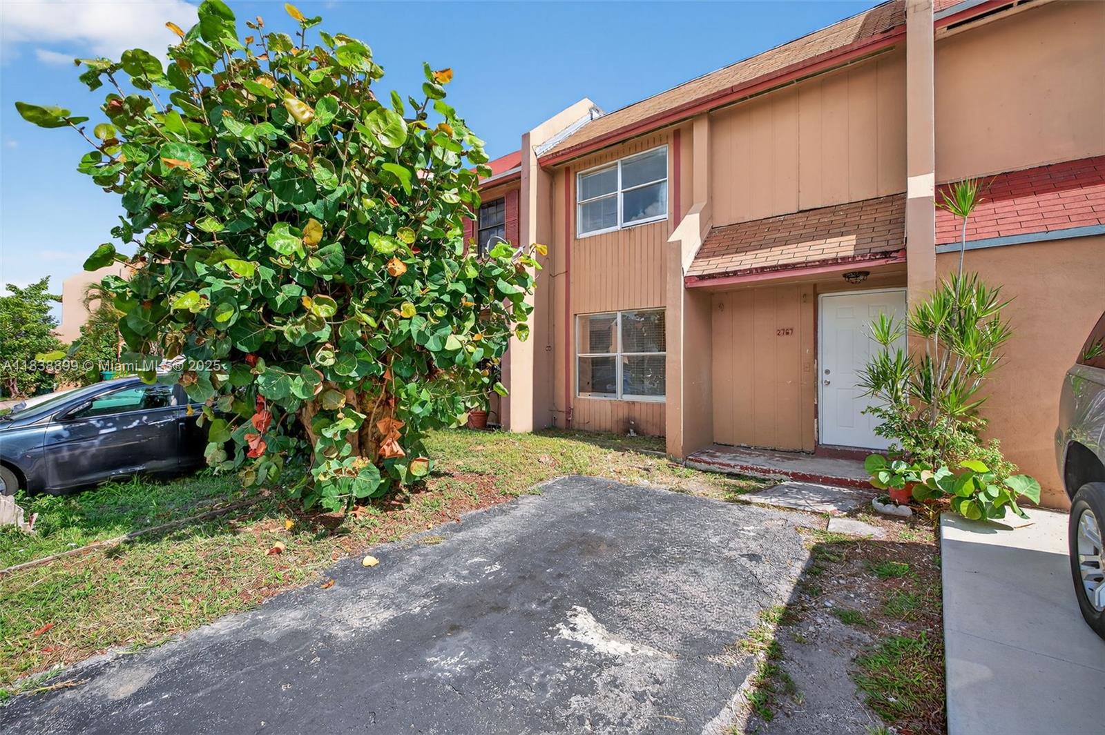 This 3-bedroom, 1.5-bath townhome is a great value-add opportunity for investors. Located walking distance from Hard Rock Stadium, major shopping, dining, and highways, it's ideally positioned in a high-demand area with strong rental potential. The home features a functional layout with a spacious living area, three bedrooms, and a private fenced yard—great for tenants or future owners. Recent updates include a brand new roof and new laminate flooring, offering a strong head start on improvements. The rest of the home is ready for your finishing touches, making it a perfect project for investors looking to add value quickly. Whether you're expanding your portfolio or tackling your next flip, this townhome offers location, updates, and upside—all at a great price point.