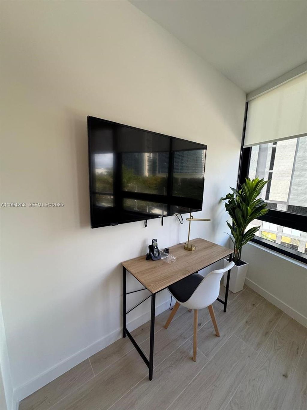 Photo of 225 N Miami Ave #302, Miami, FL 33128 (MLS # A11994263)