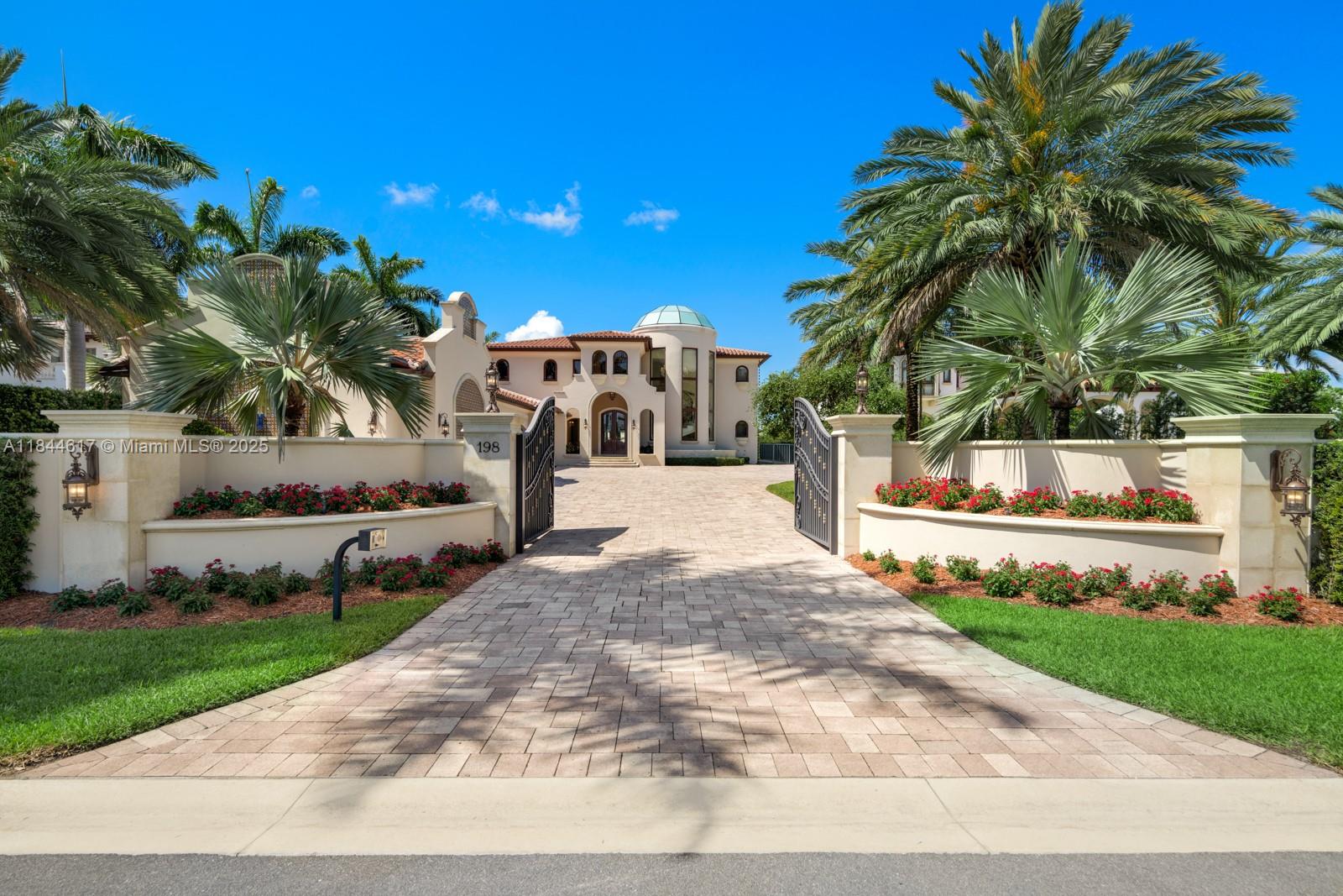 Experience unrivaled luxury on Miami Beach’s exclusive, guard-gated Palm Island. This extraordinary 11,650 SF estate boasts 100 feet of prime waterfront with sweeping Biscayne Bay views, direct access, and private dockage. Designed for effortless resort-style living, the 8-bedroom, 9 full and 2 half bath residence features expansive interiors, a gourmet chef’s kitchen, formal dining, and elegant entertaining spaces. Outside, enjoy a private pool, covered terraces, and lush tropical landscaping. Just minutes from South Beach, the Design District, and world-class dining and shopping.