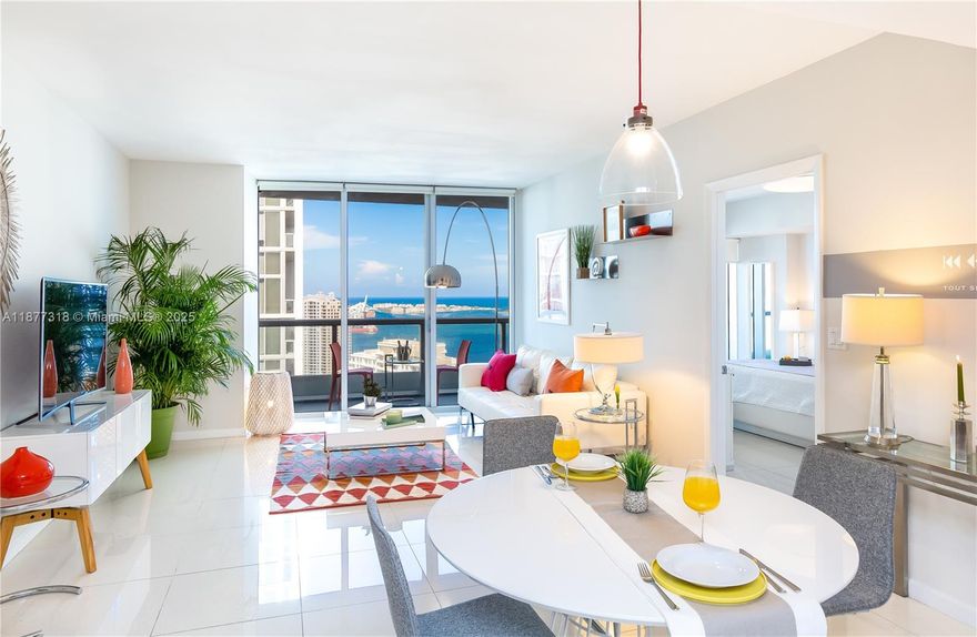 Bay and City Views from 41st Floor at Icon Residences at the heart of Brickell. Remodeled by pro designer, completely equipped with refined furniture and complements, original art works, design tableware, high quality linen and towels, HD Smart TVs, full size washer/dryer, Italian cabinets, premium appliances by Wolf & Subzero and Bosch, as well as solid black granite counters. It includes all kitchen utilities, pots & pans, toaster, dishes, glasses and cutlery…etc.