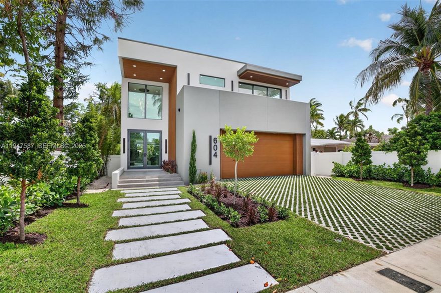 BRAND NEW 2026 ALL CONCRETE AND STEEL CONSTRUCTION- OPEN HOUSE WILL START IN MAY 2026 WHEN HOUSE IS 100% COMPLETED.  Showcasing elevated modern design built for strength, durability, and longevity. Enter through a dramatic double-height foyer highlighted by a glass staircase and designer accent walls. The main level offers a seamless open-concept layout with expansive living, dining, and kitchen spaces, plus a full guest bedroom with en-suite bath—ideal for guests or multi-generational living. Upstairs features three additional bedrooms, including a spacious primary suite, a versatile loft for an office or lounge, custom walk-in closets in every bedroom, and a generous walk-in pantry. Outdoors, enjoy a private saltwater heated pool and spa, BBQ area great for family gatherings and entertaining.  Located in Tarpon River, a highly desirable neighborhood just minutes from Downtown Fort Lauderdale, the beach, and the airport.