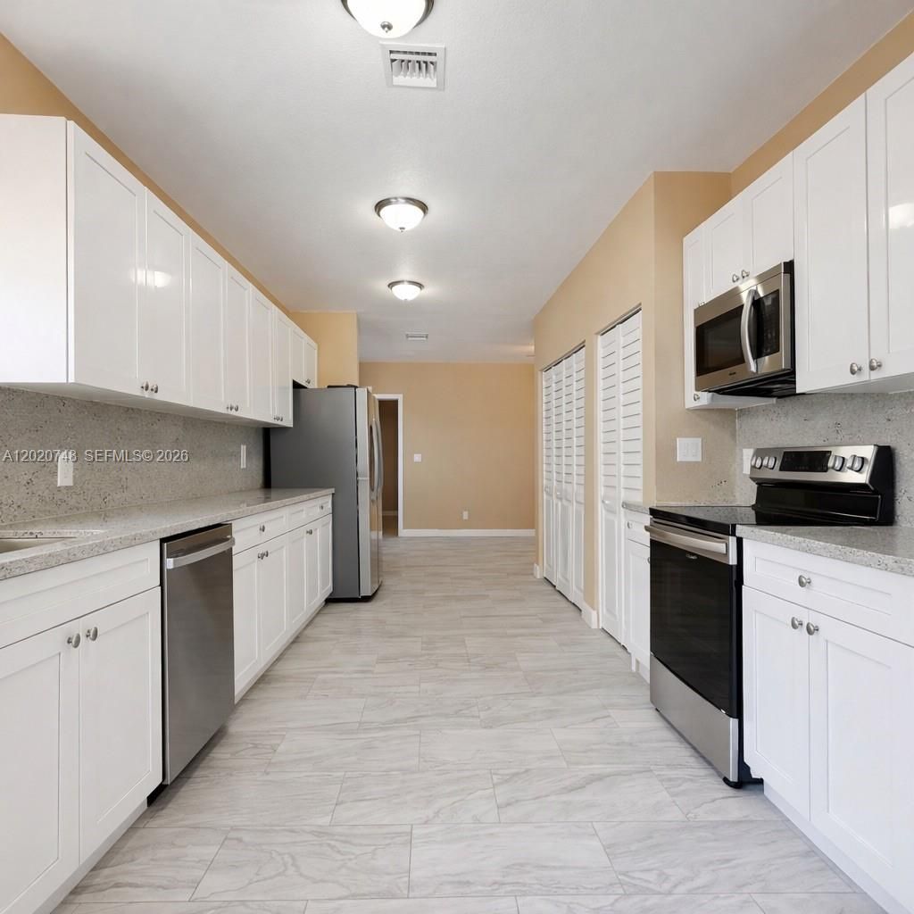 Photo of 1015 NW 8th Ave #A-B, Fort Lauderdale, FL 33311 (MLS # A12020748)