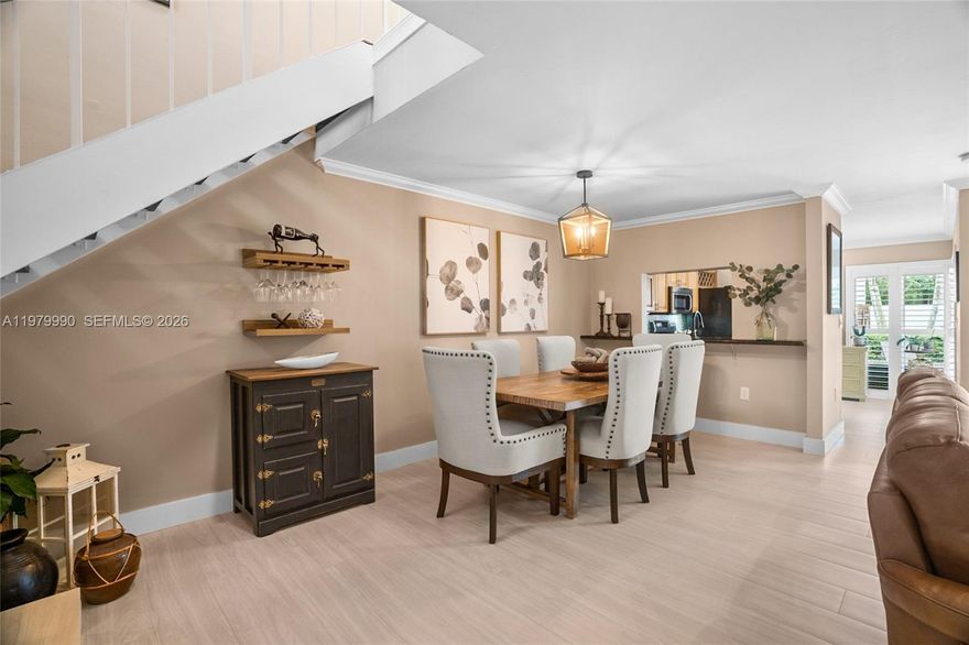 Desirable Chardonnay Sunset on the Parc! Beautifully updated 2BR/2.5BA townhome in a quiet, established neighborhood near Baptist Hospital, with easy access to the Turnpike, I-95, shopping, dining, parks, and schools. This move-in-ready home features a tile roof replaced in 2016, hurricane-impact glass slider and French doors, new ceramic plank tile flooring, remodeled bathroom, decorator plantation shutters, 2025 tankless water heater, updated stainless steel appliances, and new washer/dryer. Bright and comfortable living spaces are ideal for everyday living and entertaining. Enjoy a beautifully landscaped private enclosed back patio, perfect for relaxing, outdoor dining, or hosting guests. Chardonnay offers low-maintenance living with a well-managed, inexpensive HOA of just $189/month and amenities including a swimming pool, clubhouse, and tennis/sports court. Ideal for first-time buyers, downsizers, or investors seeking style, convenience, and value in a highly sought-after Miami community.