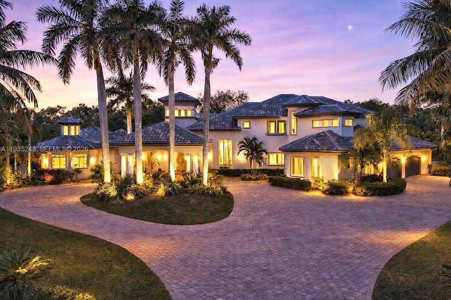 BRING YOUR OFFER! ESTATE LEVEL OPPORTUNITY | Located on a 1.53-acre cul-de-sac lot in the prestigious gated community of Windmill Ranch Estates, this expansive residence offers a rare opportunity to own a property defined by exceptional land, scale, and amenities. Built in 1999 and enhanced with select interior updates, the home provides a strong foundation for a remarkable luxury estate in one of Weston’s most desirable neighborhoods, Windmill Ranch Estates.

The residence features 6 bedrooms, all ensuite, including a first-floor primary suite, 6½ bathrooms, an office/den, exercise room, and a spacious loft. Soaring ceilings and a well-designed layout create excellent flow for both daily living and entertaining. A beautifully updated modern kitchen, with contemporary finishes and a large center island, serves as the centerpiece of the home and opens to formal and informal living areas with views of the backyard.

Outdoor amenities include a private tennis court, pool with spa, and expansive patio areas surrounded by mature landscaping, offering privacy and flexibility for outdoor enjoyment. Additional highlights include a grand circular driveway, porte-cochère, 4-car garage, and a new roof, adding meaningful value and peace of mind.

The home reflects normal wear and presents a well-priced opportunity to own and personalize a true estate property within Windmill Ranch Estates.