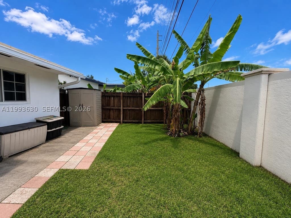 Photo of 1878 NW 45th Ct, Tamarac, FL 33309 (MLS # A11993630)