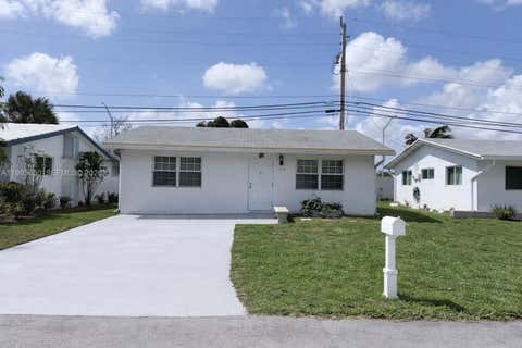 Photo of 1878 NW 45th Ct, Tamarac, FL 33309 (MLS # A11993630)