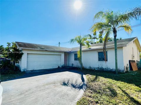 Photo of 11056 NW 23rd Ct, Sunrise, FL 33322 (MLS # A11958244)