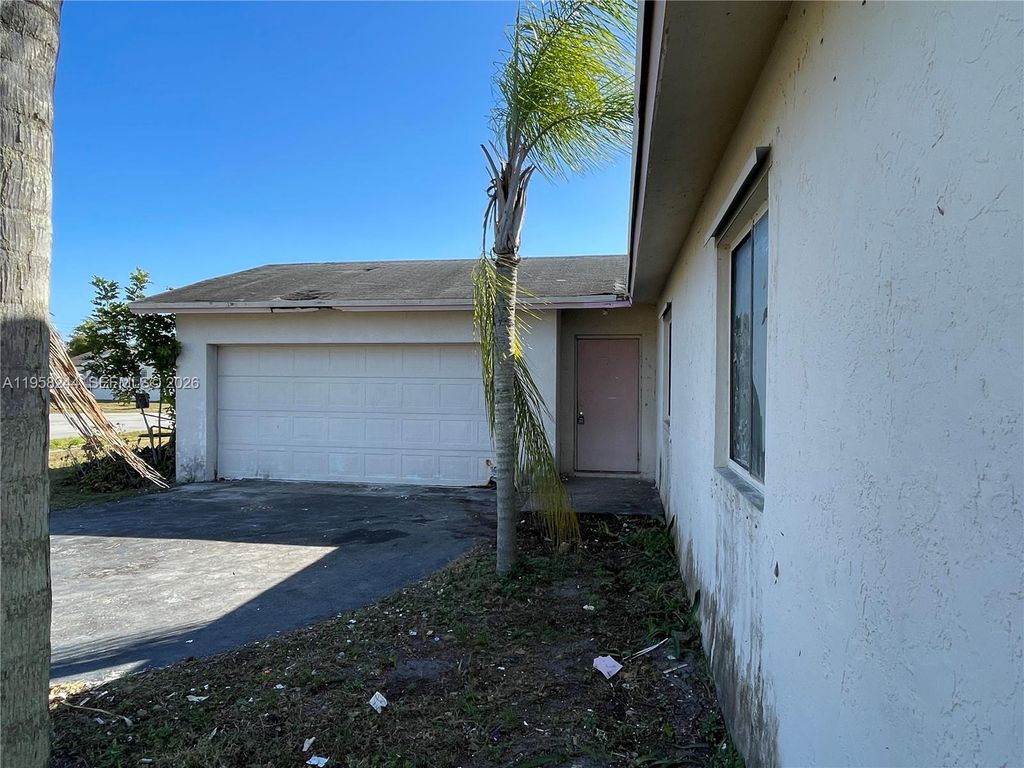 Photo of 11056 NW 23rd Ct, Sunrise, FL 33322 (MLS # A11958244)