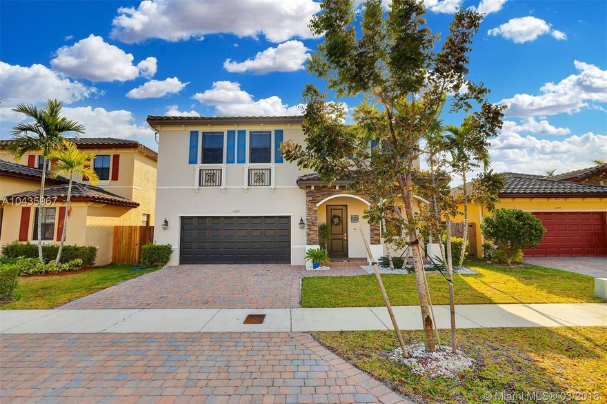 You will Fall In Love with this Jewel! Model: The IRIS. Beautiful home built in 2015, ready to move in 2 story, 4 bedrooms, 2 1/2 baths and 2 car garage with covered entry. Inside upgrades include: Marble floors, Quartz counter top, wood cabinets & Stainless Steel Appliances with large double door refrigerator. Formal dining room and a great room. Second Story with wood look tiles. Over sized Master bedroom w/dual sinks, shower & tub, his & hers walk-in closets. Second bathroom with dual sinks & tub.2,237 sq ft under A/C, 458 sq ft 2-car garage, 97 sf covered entry. Very spacious patio with beautiful & resistant pergola & deck for your entertainment. Room for pool. Brand New Club House includes pool, jacuzzi, play ground & gym.