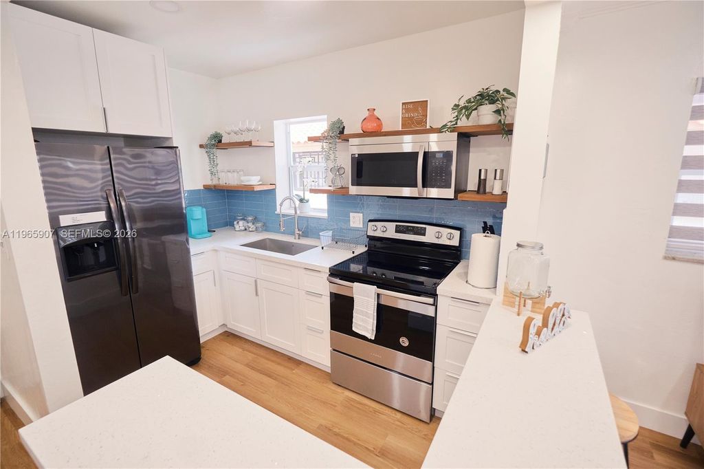 Photo of 1232 SW 30th Pl, Miami, FL 33135 (MLS # A11965907)