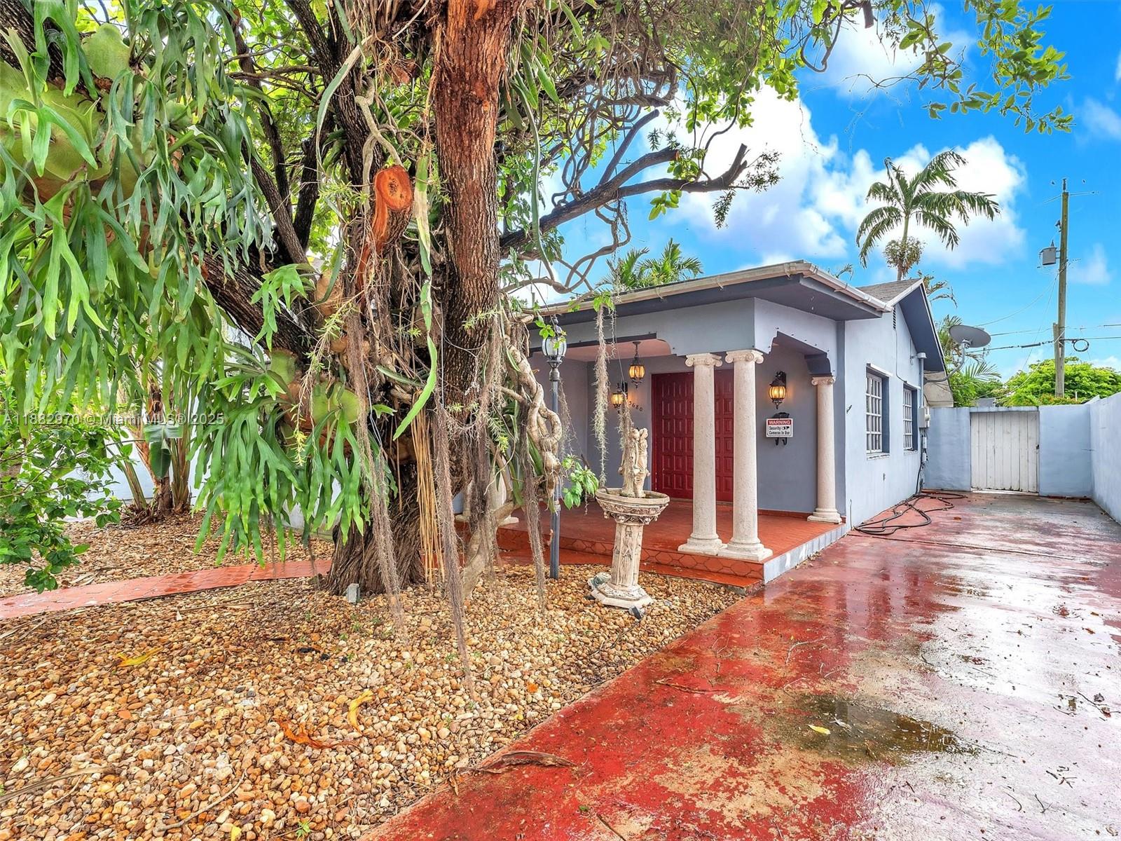 PRIME LOCATION – EXCEPTIONAL INVESTMENT OPPORTUNITY! Perfectly positioned near the future Miami Freedom Park & Inter Miami Stadium, just minutes from Miami International Airport, this property sits in the highly desirable Grapeland Heights. Ideal for first-time buyers or savvy investors, it offers plenty of potential to customize & add value. The main home features a gorgeous porch, 3 bedrooms, 1 bathroom, a remodeled kitchen, & a laundry/utility room. The fully fenced lot includes secured parking on both sides, plus a backyard retreat w/lush landscaping, garden walkways, & tranquil pond. A storage shed adds extra convenience & flexibility. Unbeatable location minutes from the Airport, Jackson, Marlins Park, CoralGables, Downtown, Brickell, & highways. This home is priced to sell quickly!